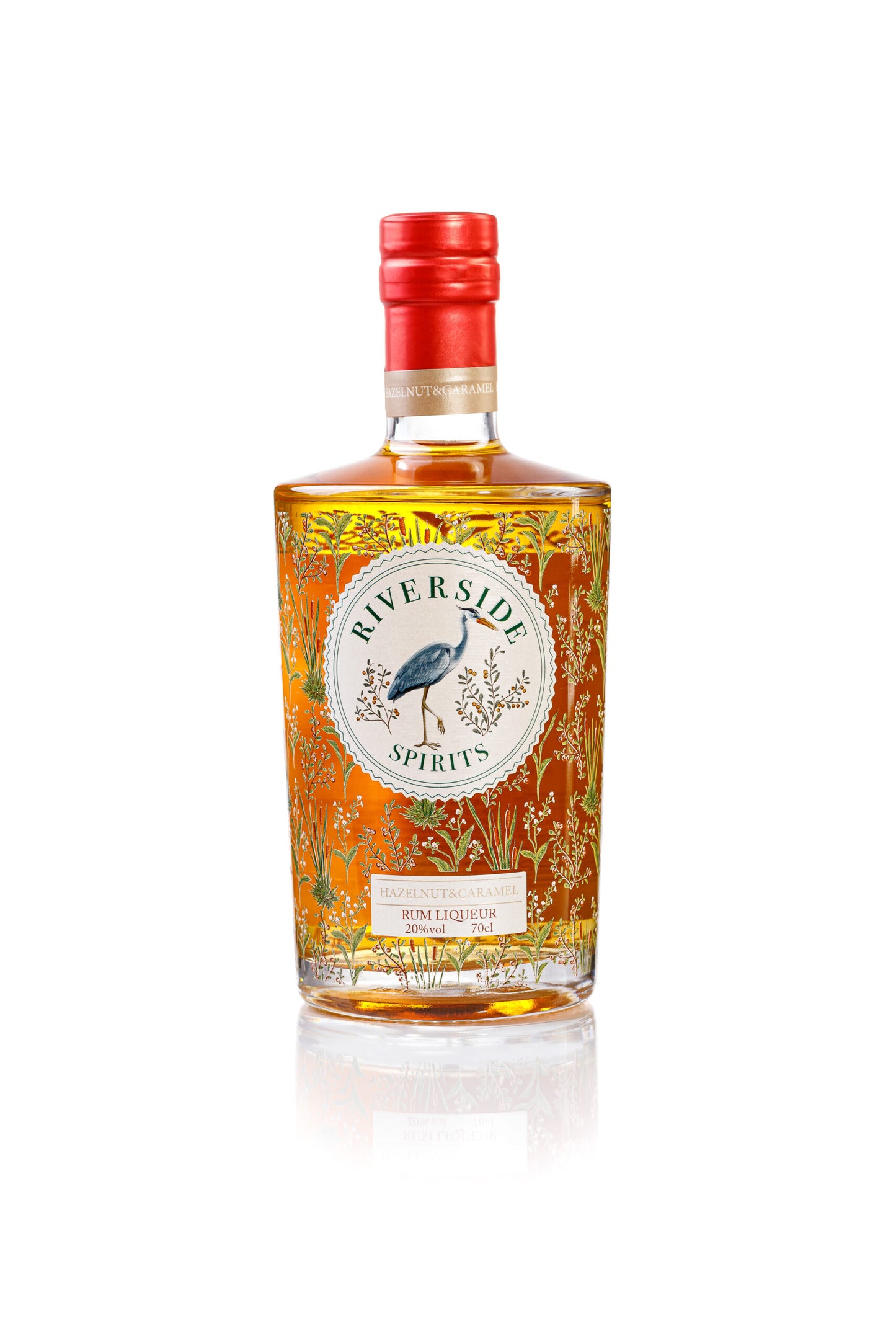 Bottle of Riverside Spirits hazelnut & caramel rum liqueur on a white background