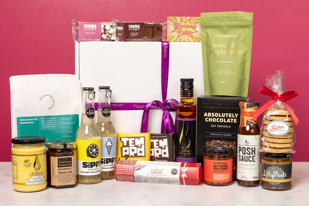 A Hamper of personalised treats including chocolates, biscuits, sauces and drinks from Stort Valley Gifting