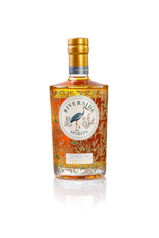 Bottle of Riverside Spirits whiskey liqueur with decorative label on a white background