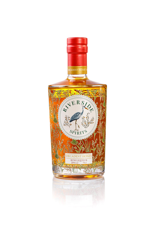 Bottle of Riverside Spirits Honeycomb Rum Liqueur on a white background