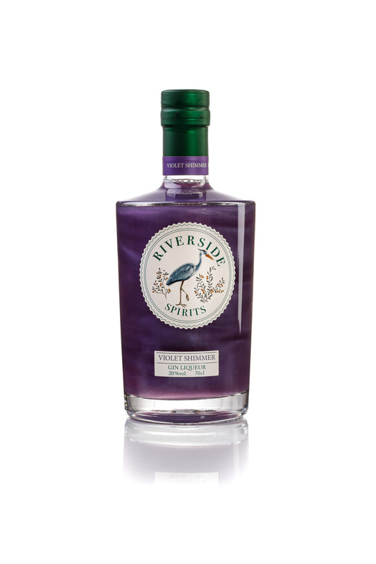 Purple bottle of Riverside Spirits Parma Violet Gin Liqueur on a white background