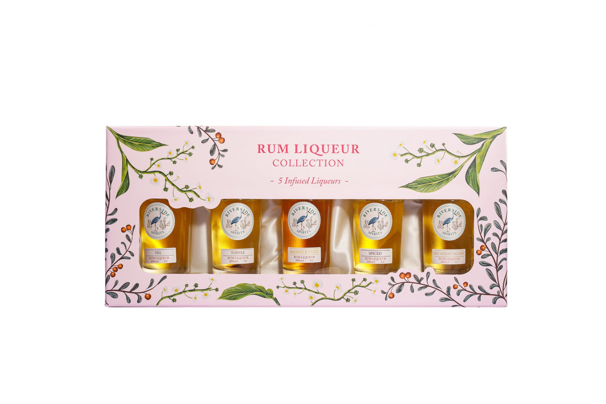 Set of rum liqueur bottles in a decorative box with floral designs on a white background available at Stort Valley Gifting