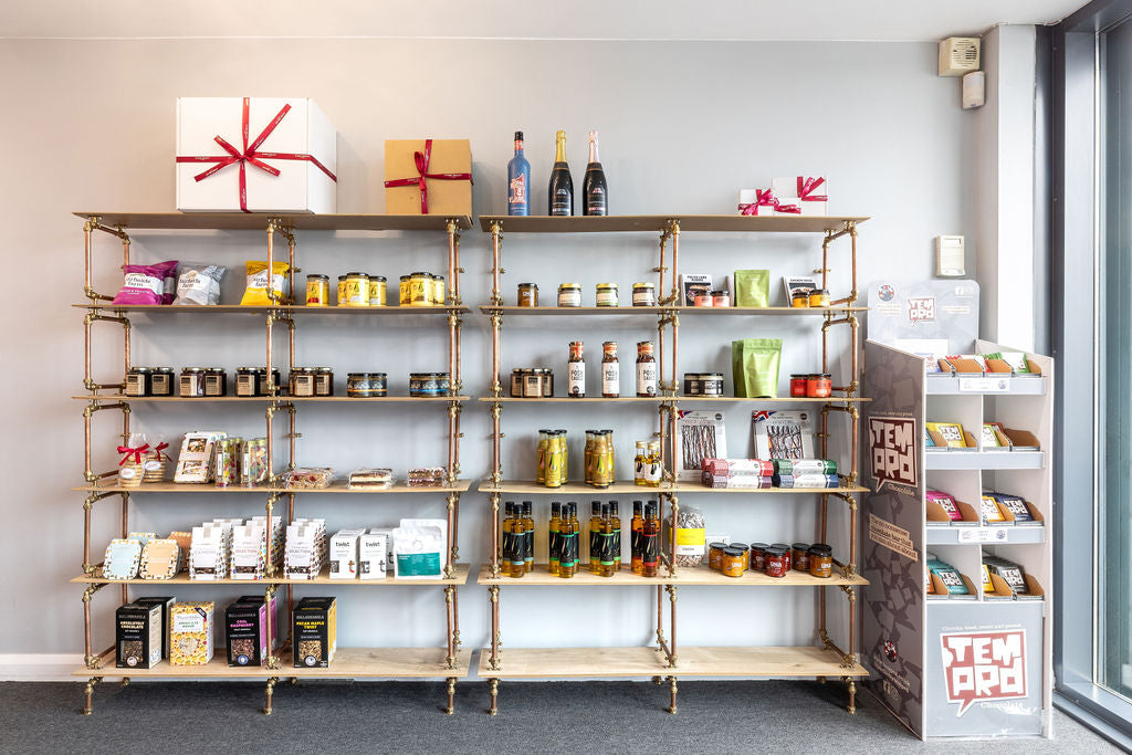 Shelves with various products in the Stort Valley Gifting Hamper Hub 