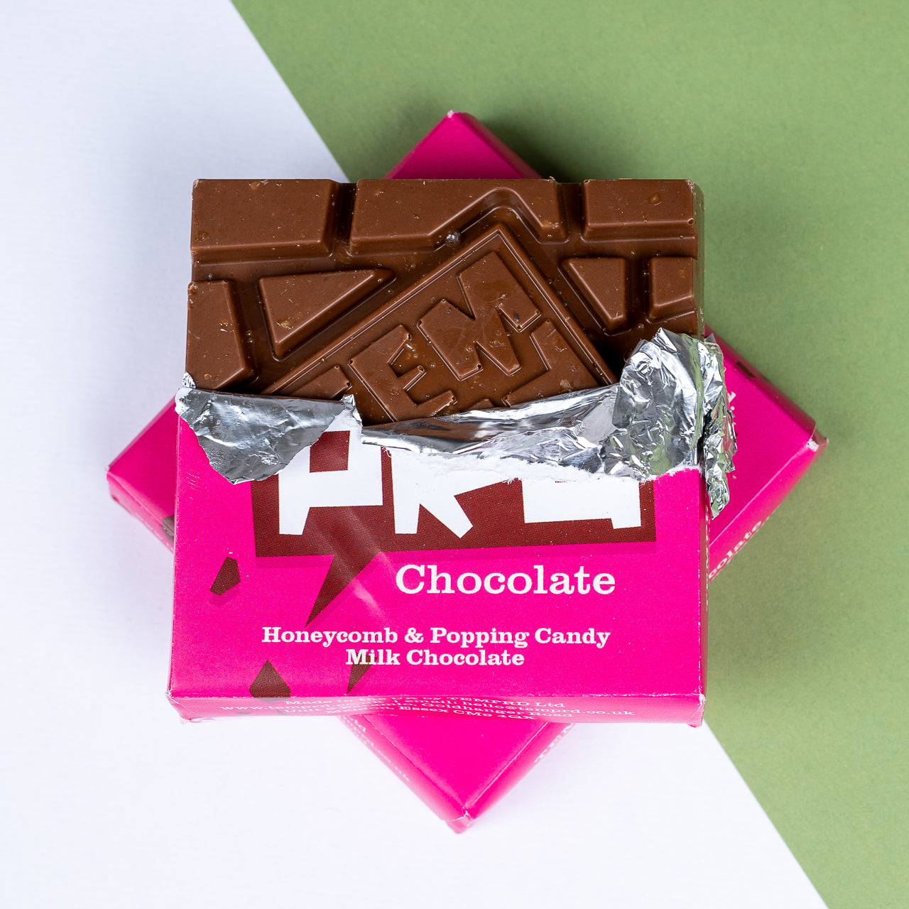 Temprd Honeycomb & Popping Candy Milk Chocolate on a green and white background available from Stort Valley Gifting