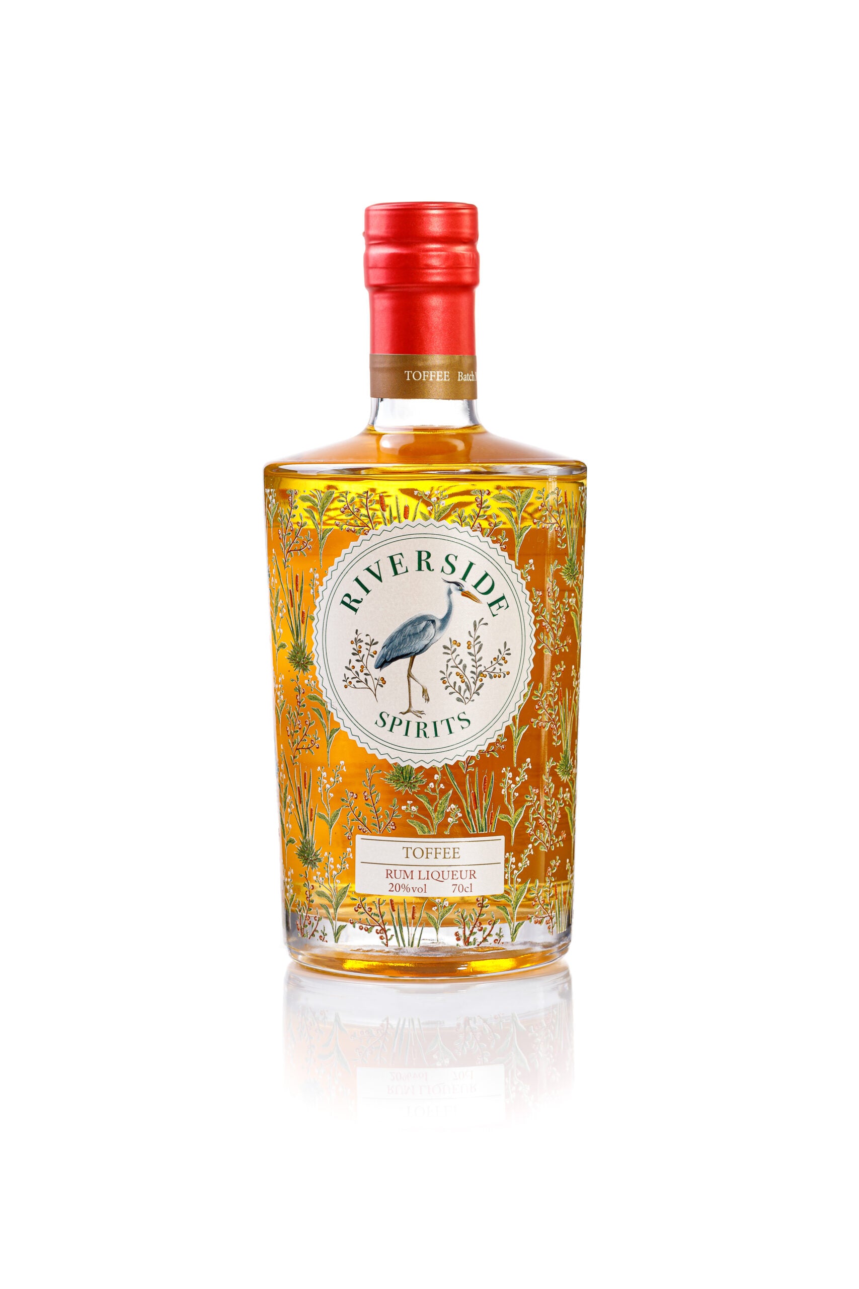 Bottle of Riverside Spirits toffee rum liqueur on a white background