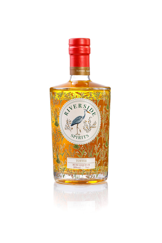 Bottle of Riverside Spirits toffee rum liqueur on a white background